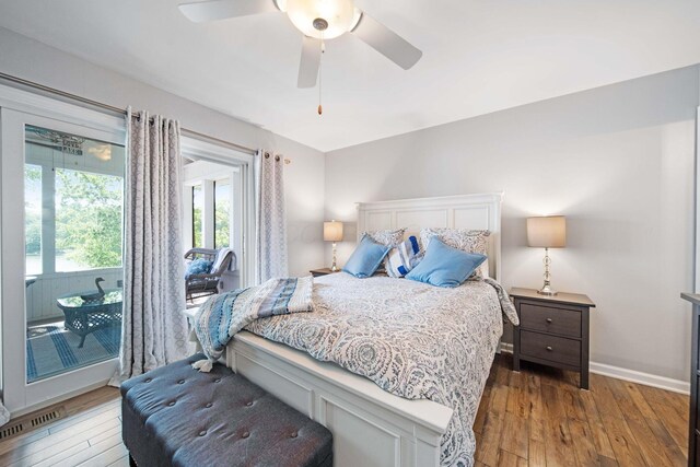 7326 State Route 19 Unit 2, Lots 27-30, Mount Gilead, OH 43338 - bedroom with hardwood / wood-style floors, access to outside, and a ceiling fan