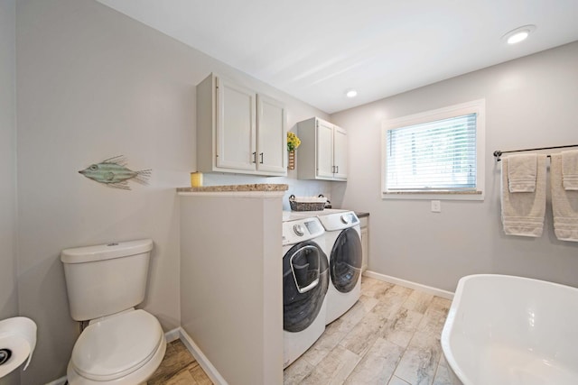 7326 State Route 19 Unit 2, Lots 27-30, Mount Gilead, OH 43338 - laundry room with washing machine and dryer and light wood finished floors