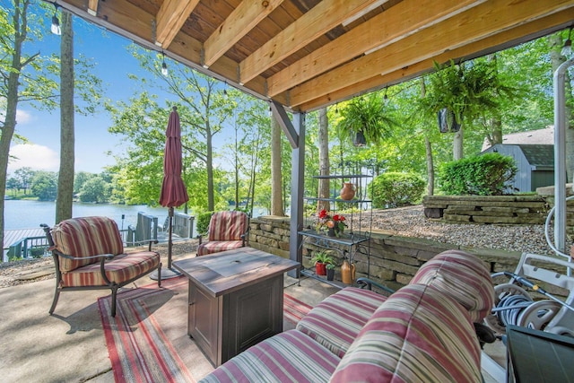 7326 State Route 19 Unit 2, Lots 27-30, Mount Gilead, OH 43338 - view of patio featuring a water view and a fire pit