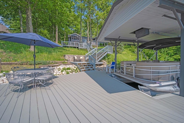 7326 State Route 19 Unit 2, Lots 27-30, Mount Gilead, OH 43338 - dock area with stairs, a wooden deck, and outdoor dining space