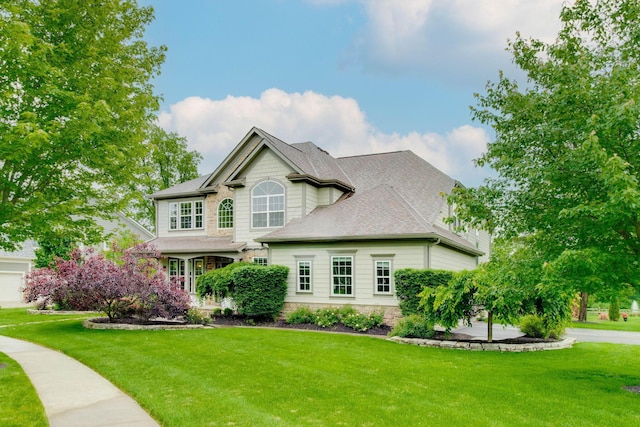 2898 Braden Way, Blacklick, OH 43004 - traditional-style house with a front yard, stone siding, and roof with shingles