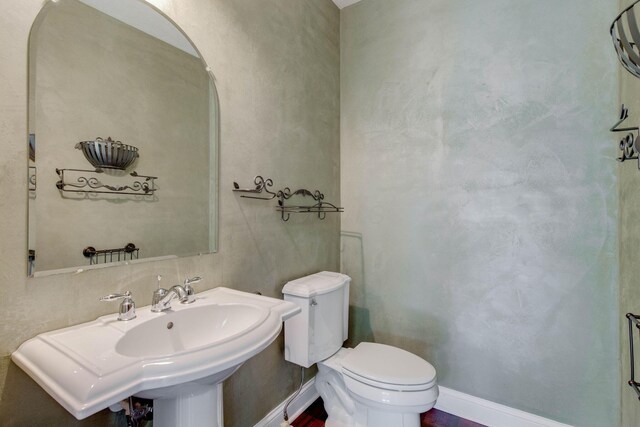2898 Braden Way, Blacklick, OH 43004 - bathroom featuring toilet, a sink, and baseboards