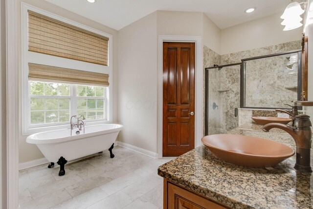 2898 Braden Way, Blacklick, OH 43004 - full bath featuring double vanity, a stall shower, baseboards, a soaking tub, and recessed lighting