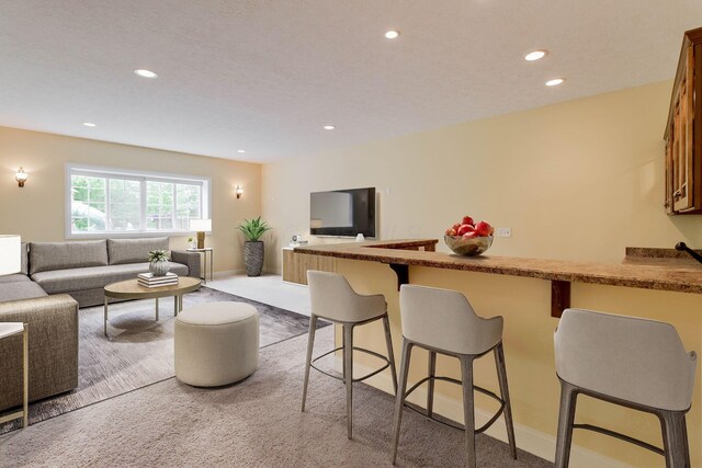2898 Braden Way, Blacklick, OH 43004 - carpeted living area with recessed lighting and baseboards