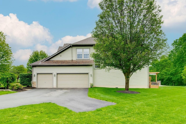 2898 Braden Way, Blacklick, OH 43004 - view of front of house with driveway, a front lawn, a shingled roof, and a garage