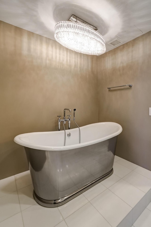1 Miranova Pl Unit 1225, Columbus, OH 43215 - bathroom featuring a soaking tub and tile patterned floors