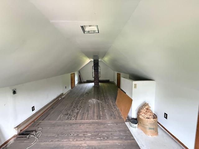 778 Berkeley Rd, Columbus, OH 43205 - additional living space featuring wood finished floors, vaulted ceiling, and baseboards
