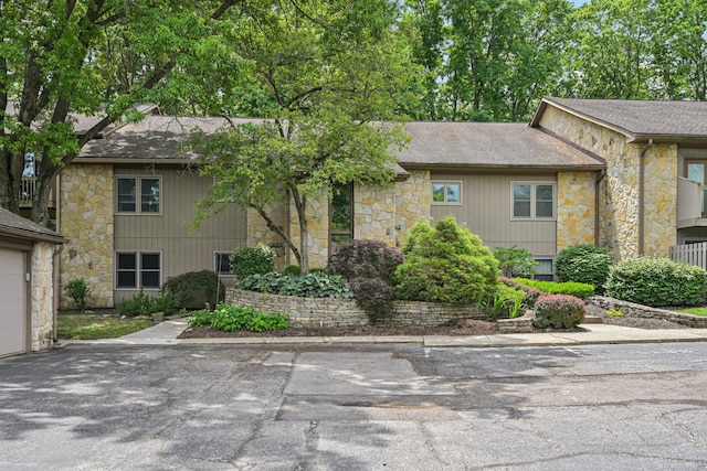 3137 Griggsview Ct Unit 3137, Columbus, OH 43221 - view of front of property with stone siding and a shingled roof