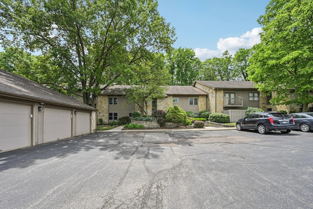 3137 Griggsview Ct Unit 3137, Columbus, OH 43221 - view of front facade with stone siding and community garages
