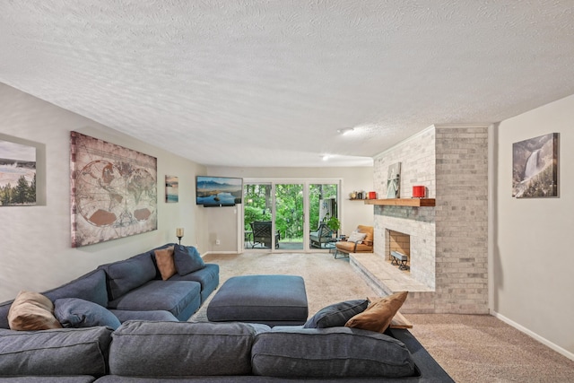 3137 Griggsview Ct Unit 3137, Columbus, OH 43221 - carpeted living area featuring a textured ceiling, a fireplace, and baseboards