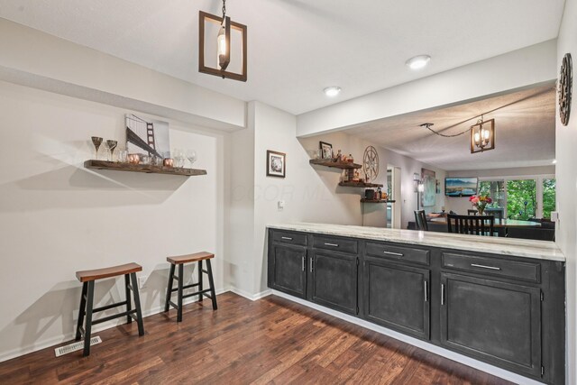 3137 Griggsview Ct Unit 3137, Columbus, OH 43221 - indoor dry bar featuring dark wood-style flooring, hanging light fixtures, baseboards, and recessed lighting