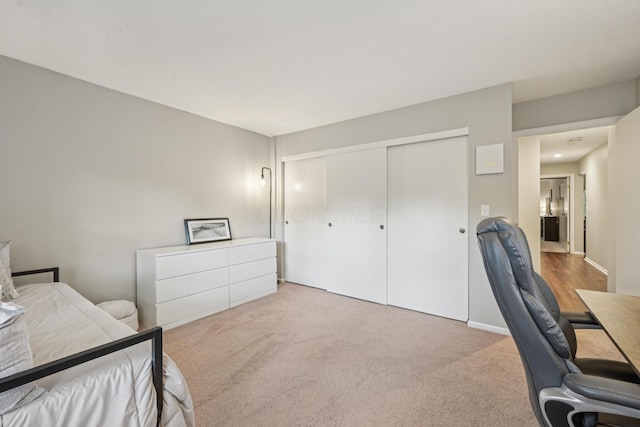 3137 Griggsview Ct Unit 3137, Columbus, OH 43221 - carpeted bedroom with a closet, a desk, and baseboards