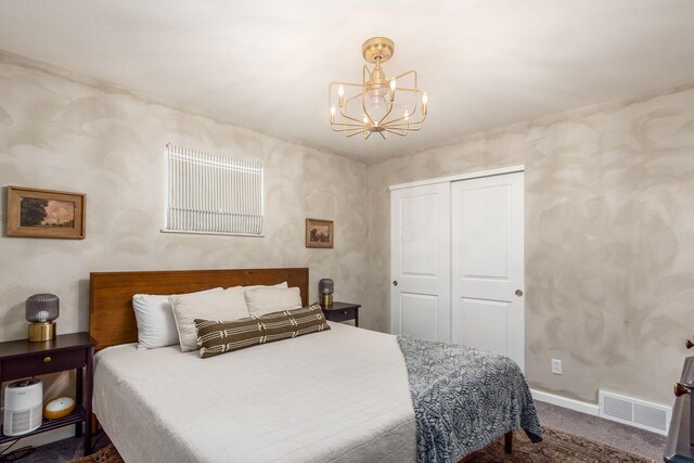776 Galloway Rd, Galloway, OH 43119 - bedroom featuring a chandelier, a closet, carpet, and baseboards