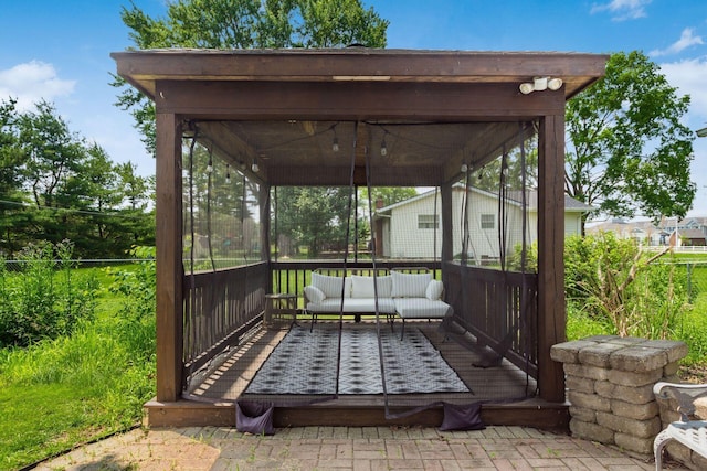 776 Galloway Rd, Galloway, OH 43119 - view of patio featuring a wooden deck, a sunroom, and outdoor lounge area