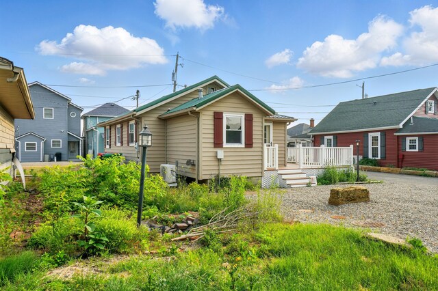 4881 Decker Ave NE, Thornville, OH 43076 - rear view of house with a wooden deck