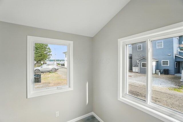 4881 Decker Ave NE, Thornville, OH 43076 - unfurnished room with vaulted ceiling and baseboards