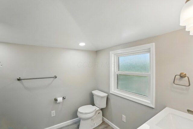 4881 Decker Ave NE, Thornville, OH 43076 - bathroom with toilet, baseboards, recessed lighting, and a sink