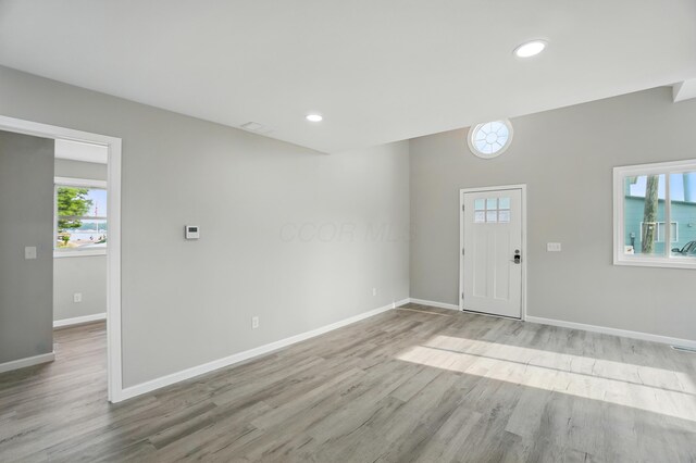 4881 Decker Ave NE, Thornville, OH 43076 - foyer entrance featuring baseboards, wood finished floors, healthy amount of natural light, and recessed lighting