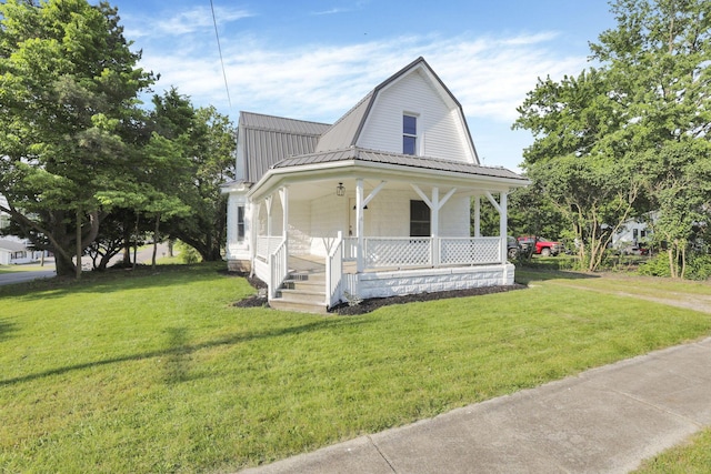 800 S Detroit St, Bellefontaine, OH 43311 - dutch colonial with a porch, a gambrel roof, a front yard, and metal roof