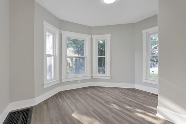 800 S Detroit St, Bellefontaine, OH 43311 - empty room featuring baseboards and wood finished floors