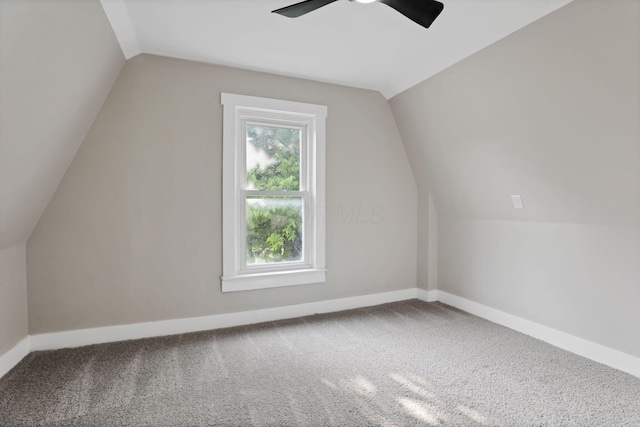 800 S Detroit St, Bellefontaine, OH 43311 - additional living space featuring lofted ceiling, a ceiling fan, carpet flooring, and baseboards