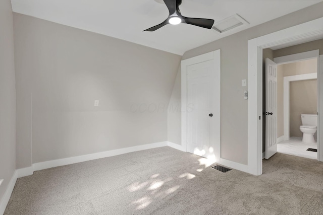 800 S Detroit St, Bellefontaine, OH 43311 - unfurnished bedroom with carpet floors, attic access, baseboards, and vaulted ceiling