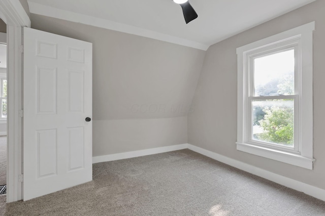 800 S Detroit St, Bellefontaine, OH 43311 - additional living space featuring carpet floors, a ceiling fan, baseboards, and lofted ceiling