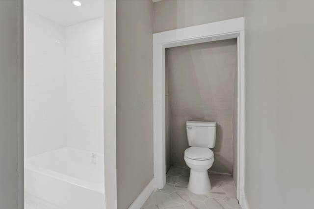800 S Detroit St, Bellefontaine, OH 43311 - full bathroom with toilet, tile patterned floors, and baseboards
