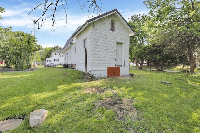 800 S Detroit St, Bellefontaine, OH 43311 - view of home's exterior with a yard and cooling unit