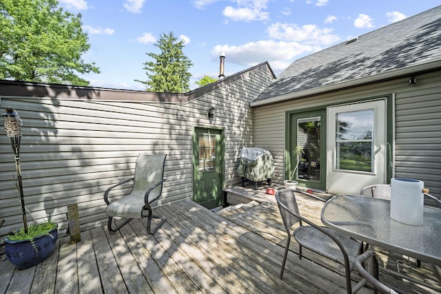 2107 Radnor Ave, Columbus, OH 43224 - wooden terrace featuring grilling area and outdoor dining area