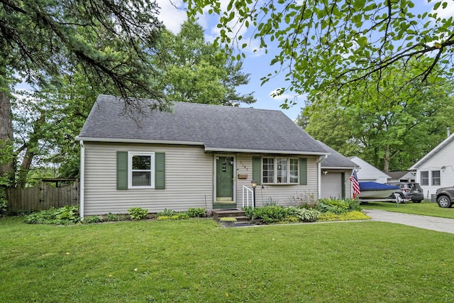 2107 Radnor Ave, Columbus, OH 43224 - view of front facade featuring roof with shingles and a garage