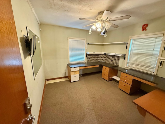 120 Chandler Ave, London, OH 43140 - unfurnished office with built in desk, a ceiling fan, baseboards, and carpet floors
