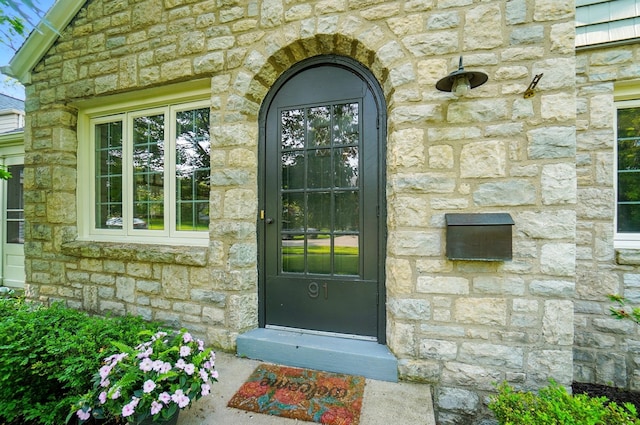 91 Nottingham Rd, Columbus, OH 43214 - doorway to property featuring stone siding