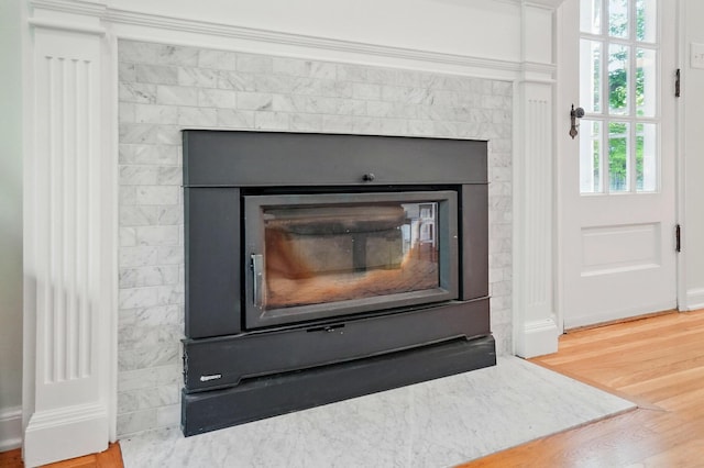 91 Nottingham Rd, Columbus, OH 43214 - detailed view of a glass covered fireplace and wood finished floors