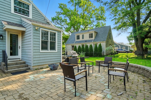 91 Nottingham Rd, Columbus, OH 43214 - view of patio with entry steps and a grill