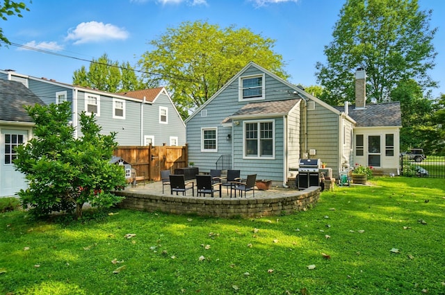 91 Nottingham Rd, Columbus, OH 43214 - rear view of property featuring a patio and a chimney