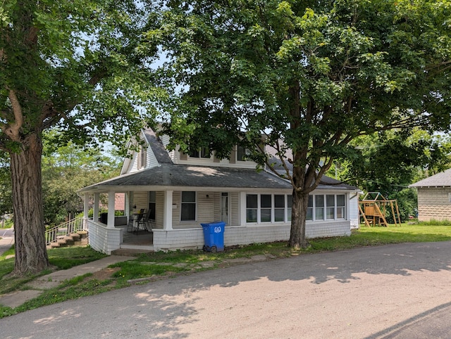 54 W High St, Mount Gilead, OH 43338 - view of front of property featuring a porch and a shingled roof