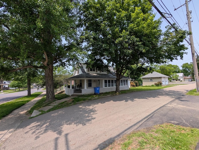 54 W High St, Mount Gilead, OH 43338 - view of front facade with a porch