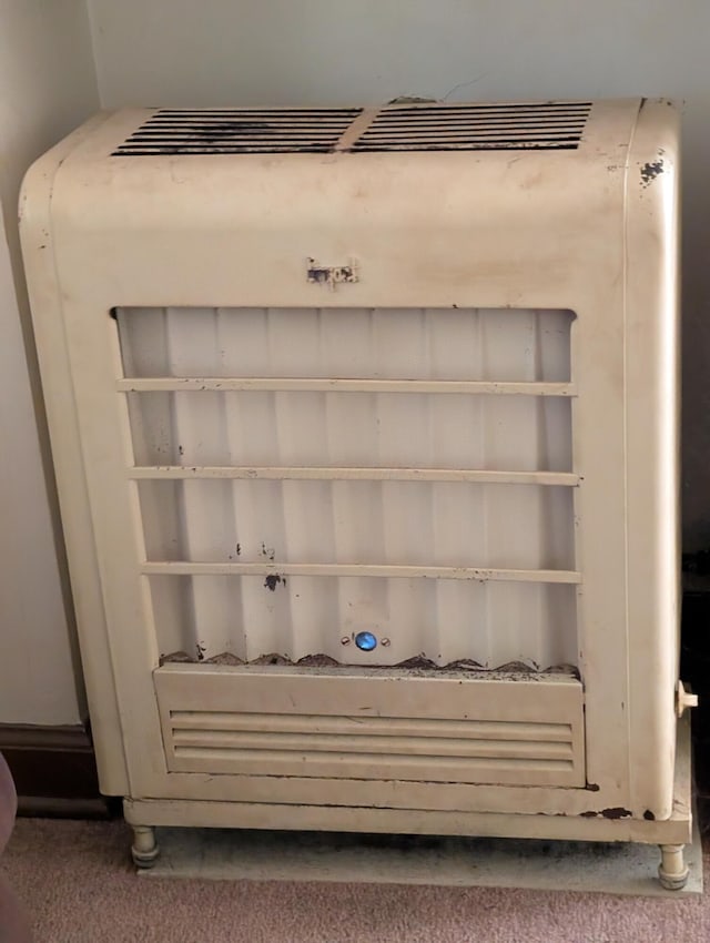 54 W High St, Mount Gilead, OH 43338 - detailed view of heating unit and carpet