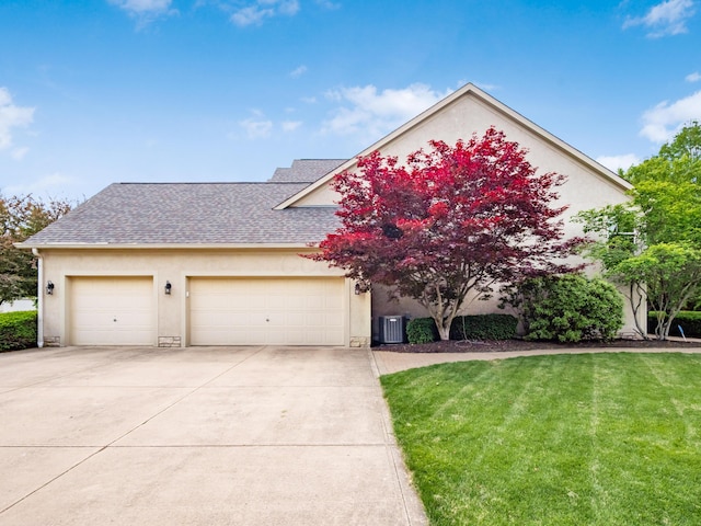 6810 Bearclover Dr, Dublin, OH 43016 - view of front of property with stucco siding, a shingled roof, and central AC