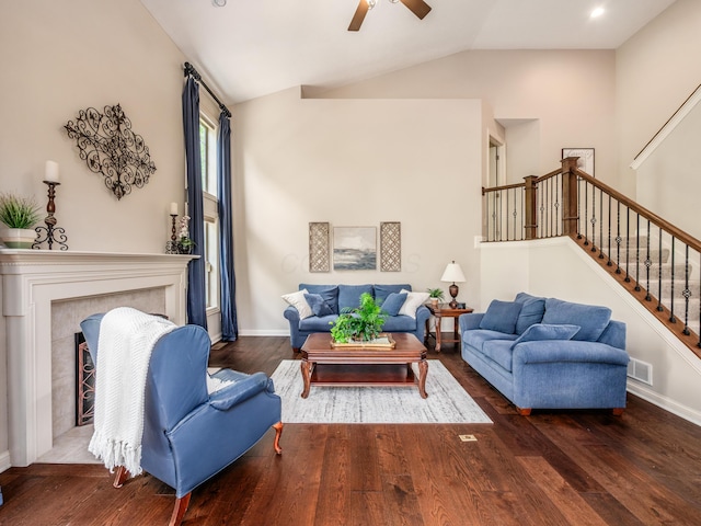 6810 Bearclover Dr, Dublin, OH 43016 - living area featuring ceiling fan, stairway, lofted ceiling, wood finished floors, and baseboards