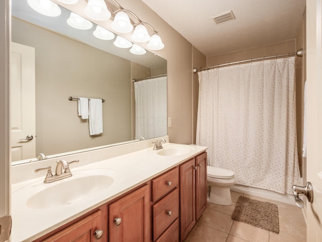 6810 Bearclover Dr, Dublin, OH 43016 - full bath with tile patterned flooring, toilet, double vanity, and curtained shower