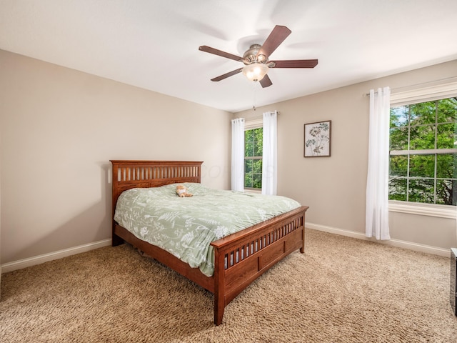 6810 Bearclover Dr, Dublin, OH 43016 - bedroom with carpet floors, baseboards, and a ceiling fan