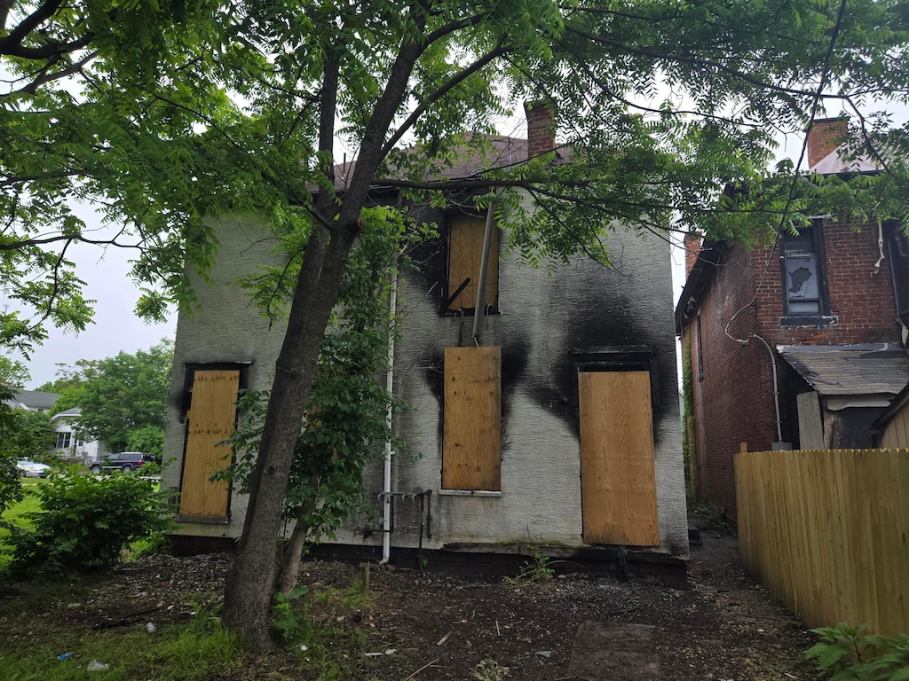 view of front of house with a chimney