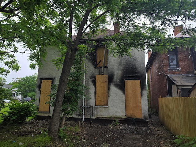 view of front of house with a chimney