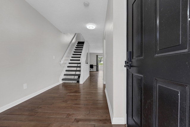 2523 Dahlia Way Unit 63B, Columbus, OH 43235 - entryway featuring stairs, baseboards, and wood finished floors