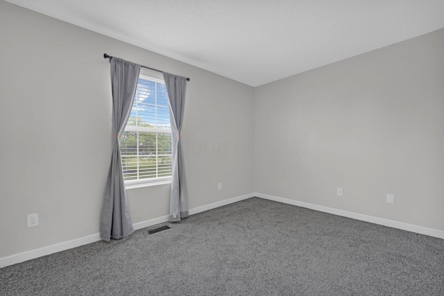 2523 Dahlia Way Unit 63B, Columbus, OH 43235 - empty room featuring carpet floors and baseboards