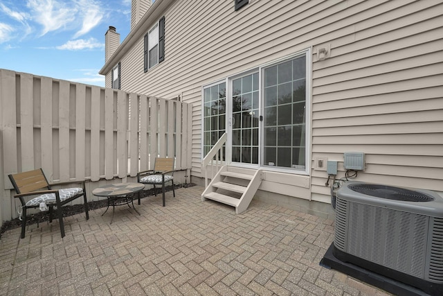 2523 Dahlia Way Unit 63B, Columbus, OH 43235 - view of patio / terrace with cooling unit and entry steps
