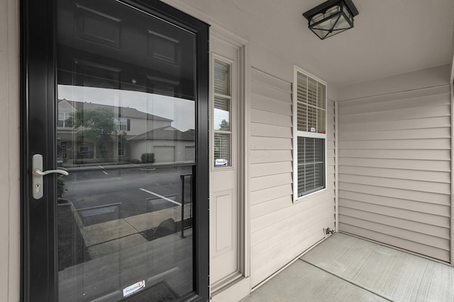 2523 Dahlia Way Unit 63B, Columbus, OH 43235 - view of exterior entry featuring covered porch