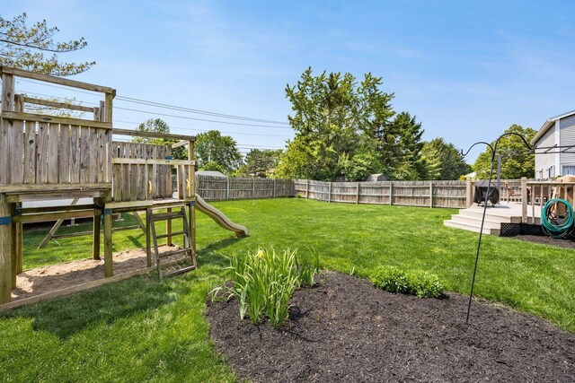 5999 Waterview Dr, Hilliard, OH 43026 - view of yard with a playground and a deck
